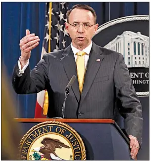  ?? AP/JACQUELYN MARTIN ?? Deputy Attorney General Rod Rosenstein said Friday in Washington that the defendants “took extraordin­ary steps to make it appear that they were ordinary American political activists.”