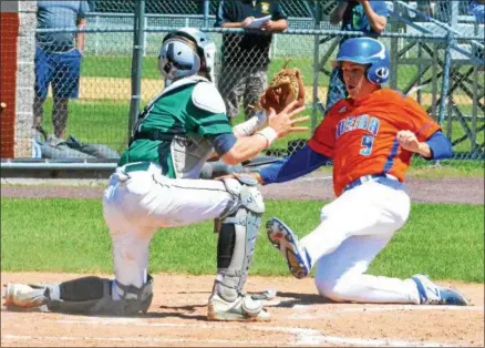  ?? KYLE MENNIG — ONEIDA DAILY DISPATCH ?? Oneida’s Casey Rich (9) slides into home as Seton Catholic Central catcher Zach Pruden (2) puts the tag down during their NYSPHSAA Class B regional final in Endicott on Saturday.