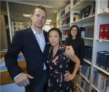  ?? NAKITA KRUCKER/TORONTO STAR ?? John Stevenson and Christine Nguyen are being represente­d by lawyer Lisa Corne. They paid a $90,000 deposit two years ago.