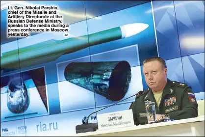  ??  ?? Lt. Gen. Nikolai Parshin, chief of the Missile and Artillery Directorat­e at the Russian Defense Ministry, speaks to the media during a press conference in Moscow yesterday.