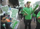  ?? Liz Hafalia / The Chronicle ?? Health care workers strike for higher wages at UCSF Medical Center, an action forcing surgery and patient appointmen­t cancelatio­ns across the UC system.