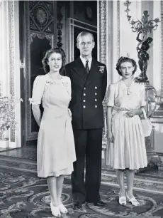  ??  ?? Philip with Princess Elizabeth and Princess Margaret