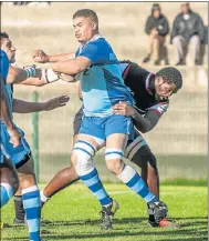  ?? Picture: MARK WEST ?? TACKLE HIM: Park’s Kuhle Sonkosi tackles feisty Progress flanker Hurlin Bosman in the final of the EPRU Grand Challenge Cup at the Wolfson Stadium at the weekend