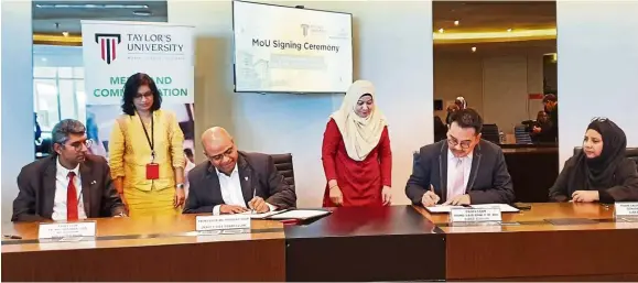  ??  ?? (From left) Neethiah, Pradeep, Mohd Said and Zalina ink the deal at the university.