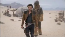  ?? JONATHAN OLLEY/LUCASFILM VIA AP ?? This image released by Lucasfilm shows Alden Ehrenreich and Joonas Suotamo in a scene from “Solo: A Star Wars Story.”