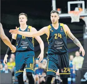  ?? FOTO: AGENCIAS ?? Jerebko y Jovic, jugadores del Khimki.
En Rusia ven difícil reanudar la Euroliga