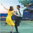  ??  ?? Emma Stone dances with Ryan Gosling in a scene from “La La Land,” nominated for seven Golden Globes. Lionsgate