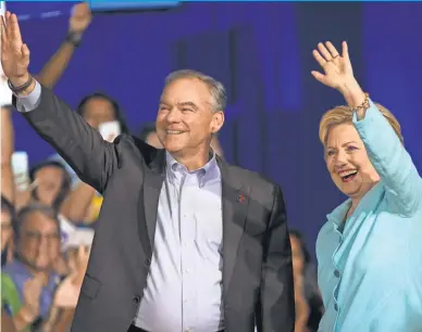  ?? DAVID ALBERS, NAPLES DAILY NEWS ?? Democrat Hillary Clinton introduces running mate Tim Kaine on Saturday in Miami.