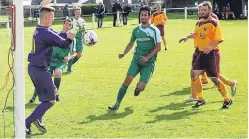  ?? Picture: John Laing. ?? James Penman gathers the ball in front of Liam Forbes in Thornton Hibs’ win over Whitburn.