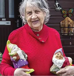  ??  ?? ‘Devastated’: Gladys Smith and two surviving gnomes