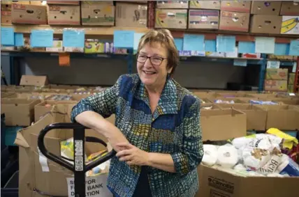  ?? FILE PHOTO, RECORD STAFF ?? Pat Singleton is retiring from the Cambridge Self-Help Food Bank after more than two decades.