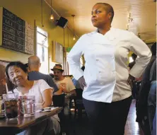  ?? Brant Ward / The Chronicle 2014 ?? Tanya Holland, seen here in 2014, saw her Brown Sugar Kitchen added to the prestigiou­s Bib Gourmand list for 2018.