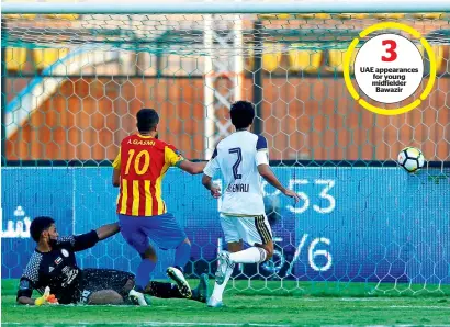  ?? Reuters ?? Ahmed Gasmi (centre) of Algeria’s NA Hussein Dey scores against UAE’s Al Wahda in the Arab Club Championsh­ip in Cairo. —