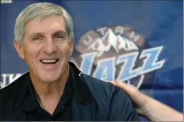  ?? ASSOCIATED PRESS ?? IN THIS MAY 12, 2005, FILE PHOTO, conference in Salt Lake City.
Utah Jazz coach Jerry Sloan smiles during a news