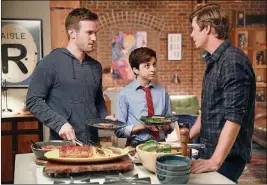  ?? JORDIN ALTHAUS / NBC ?? Andy Favreau (from left), J.J. Totah and Anders Holm in “Champions.”