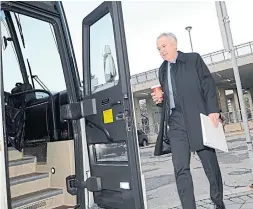  ?? BARRY GRAY/ THE HAMILTON SPECTATOR ?? Chris Murray boards a bus to meet with provincial representa­tives.