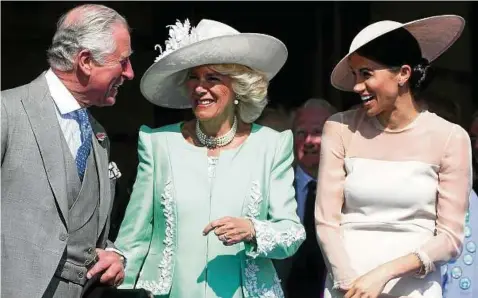  ?? Fotos: Getty Images/Chris Jackson ?? Meghan Markles erster Auftritt als „Königliche Hoheit“: Herzogin Meghan (r.) mit Prinz Charles und Herzogin Camilla.