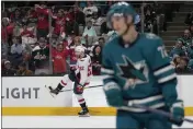  ?? JEFF CHIU — THE ASSOCIATED PRESS ?? Capitals defenseman Matt Irwin (52) celebrates after scoring a goal against the Sharks during the second period on Saturday in San Jose.