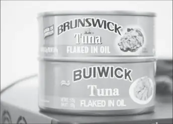  ??  ?? The packing for Brunswick Tuna, distribute­d by Beepats, is nearly identical to the Buiwick Tuna brand.