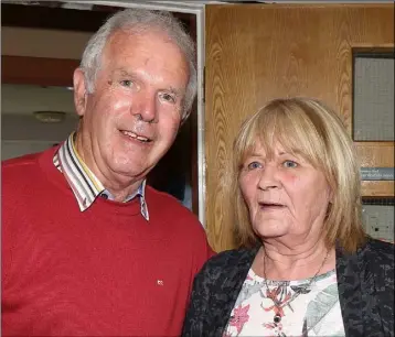  ??  ?? Tom Miller and Mary Sheridan at the coffee morning in aid of the Hope Centre, in Enniscorth­y Garda Station.