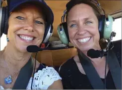  ?? Photo courtesy Anita White ?? Realtors Associatio­n of Maui member Anita White (left) and Shannon Christians­en, a captain for Mokulele Airlines, are elevating opportunit­ies for female aviators of all stripes through the Maui 99s, which works to promote aviation education, mentoring, support and scholarshi­ps on the Valley Isle.