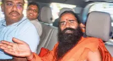  ?? PTI ?? In the dock: Yoga guru Ramdev and Patanjali Ayurved MD Acharya Balkrishna after appearing before the top court on Tuesday.