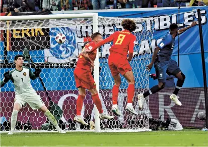  ??  ?? France defender Samuel Umtiti (right) heads the ball to score the only goal against Belgium during their World Cup semifinal at the Saint Petersburg Stadium in Saint Petersburg on Tuesday. — AFP