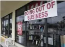 ?? Photograph: Wilfredo Lee/AP ?? A store in North Miami Beach, Florida, has a ‘Going out of business’ sign in its window.