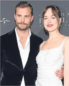  ?? Picture: Getty. ?? Jamie Dornan and Dakota Johnson at the movie premiere.