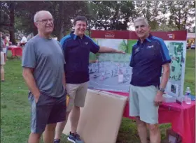  ?? BOB KEELER — MEDIANEWS GROUP ?? From left, resident Adolph Jager, Souderton-Telford Rotary President Ed Brubacker and Leon Moyer, chair of the Rotary’s fundraisin­g efforts for the planned Souderton Community Park improvemen­ts and additions, chat at a display about the plans.