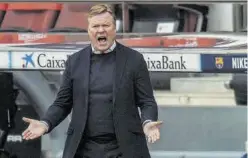  ?? JORDI COTRINA ?? Ronald Koeman se desgañita desde la banda del Camp Nou.