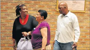  ?? Picture: THE HERALD ?? ALLEGATION­S: ANC chief whip Stone Sizani with his wife Pankie, left, in the Port Elizabeth Commercial Crimes Court in 2012, when he was an Eastern Cape MEC. With them is education official Michelle Mbaco, centre.