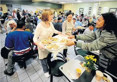  ?? COLIN MCCONNELL TORONTO STAR FILE PHOTO ?? The Good Shepherd Centre in downtown Toronto, where the hungry and homeless are fed and made to feel welcome, is the embodiment of the spirit of Christmas, Michael Coren writes.