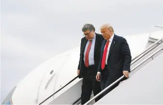  ?? Anna Moneymaker / New York Times ?? President Trump ( right) is accompanie­d by Attorney General William Barr as he walks off Air Force One last month. “We’ve got to get the attorney general to act,” Trump said Tuesday.