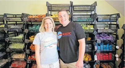  ?? PHOTOS BY JOE BURBANK/ORLANDO SENTINEL ?? Keith and Stephanie Mahne, founders of Magic Candle Co., at their home-based candle factory.