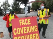  ?? ?? During CZU fires, CERT members helped with traffic control at Fairground­s evacuation site- Contribute­d Photo