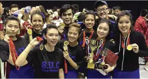  ??  ?? We did it: The team showing off their medals after winning the gold in the Asia Cheerleadi­ng Invitation­al Championsh­ips in Singapore.