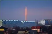  ?? AP PHOTO/VADIM BELIKOV ?? Three rockets launched against Ukraine from Russia’s Belgorod region are seen Thursday at dawn in Kharkiv, Ukraine.