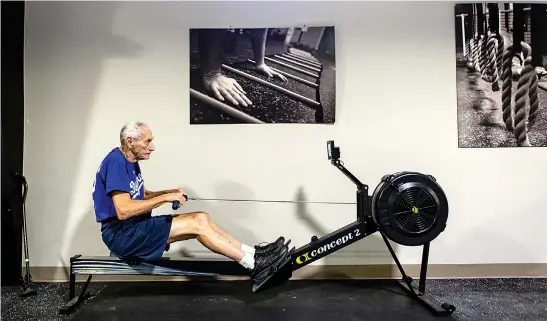  ??  ?? above
Bob Krayl warms up on the rowing machine before his workout July 15 at the CHRISTUS St. Michael's Health and Fitness Center on Monday in Texarkana, Texas.