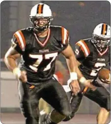  ??  ?? Pennsbury’s J.J. Denman (#77) is seen here throwing a lead block in a Falcons’ 2010 war with Frankford.