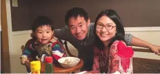  ?? (Reuters) ?? XIYUE WANG, a naturalize­d American citizen from China, arrested in Iran last August while researchin­g Persian history for his doctoral thesis at Princeton University, is shown with his wife and son.