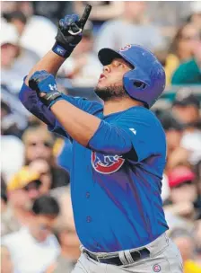  ?? | JOE SARGENT/GETTY IMAGES ?? The Cubs’ Welington Castillo gives thanks after hitting a two-run home run in the seventh inning Sunday against the Pirates.