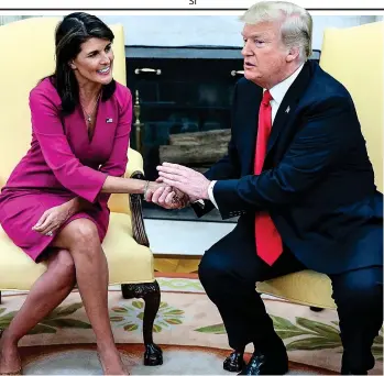  ??  ?? Love in: Donald Trump heaps praise on Nikki Haley in the Oval Office yesterday
