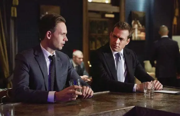  ?? SHANE MAHOOD/USA NETWORK ?? Patrick J. Adams, left, and Gabriel Macht as Mike Ross and Harvey Specter in Season 5 of Suits. The duo faces a fresh challenge as the series takes on a new storyline.