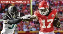  ??  ?? CHIEFS 19, JAGUARS 14 Wide receiver Chris Conley, right, and the Chiefs stick it to the Jaguars and safety Johnathan Cyprien at Kansas City.