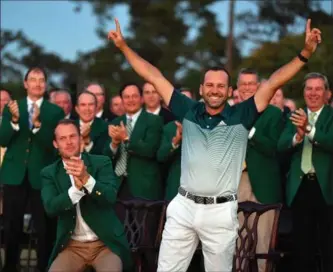  ?? BRANT SANDERLIN, TNS ?? Sergio Garcia celebrates during the green jacket ceremony at the 81st Masters tournament Sunday.