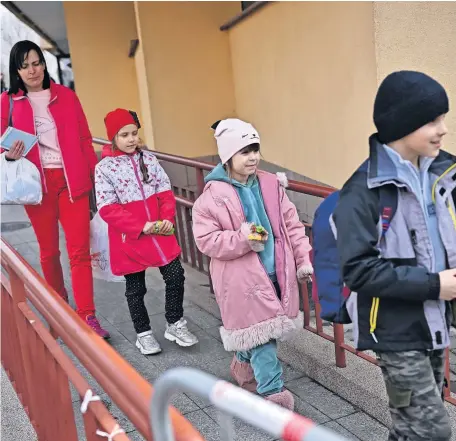  ?? ?? Safe haven Refugee Ukrainian children who have fled to Poland