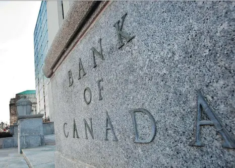  ?? GEOFF ROBINS/AFP/GETTY IMAGES/FILES ?? The Bank of Canada notes that recent developmen­ts have reinforced its view that higher interest rates will be warranted to keep inflation near its target. It added that it will take a gradual approach and be guided by the economic data.