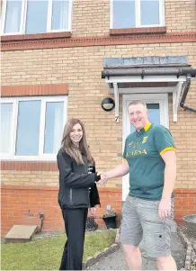  ??  ?? Great work Clair Atchison of Caledonian Windows and Doors meets happy customer Douglas Clark who has had new windows and doors installed