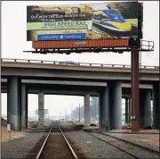  ?? AL SEIB/ LOS ANGELES TIMES FILE PHOTOGRAPH ?? A billboard in Bakersfiel­d, along Highway 99, promotes the state’s highspeed rail project.